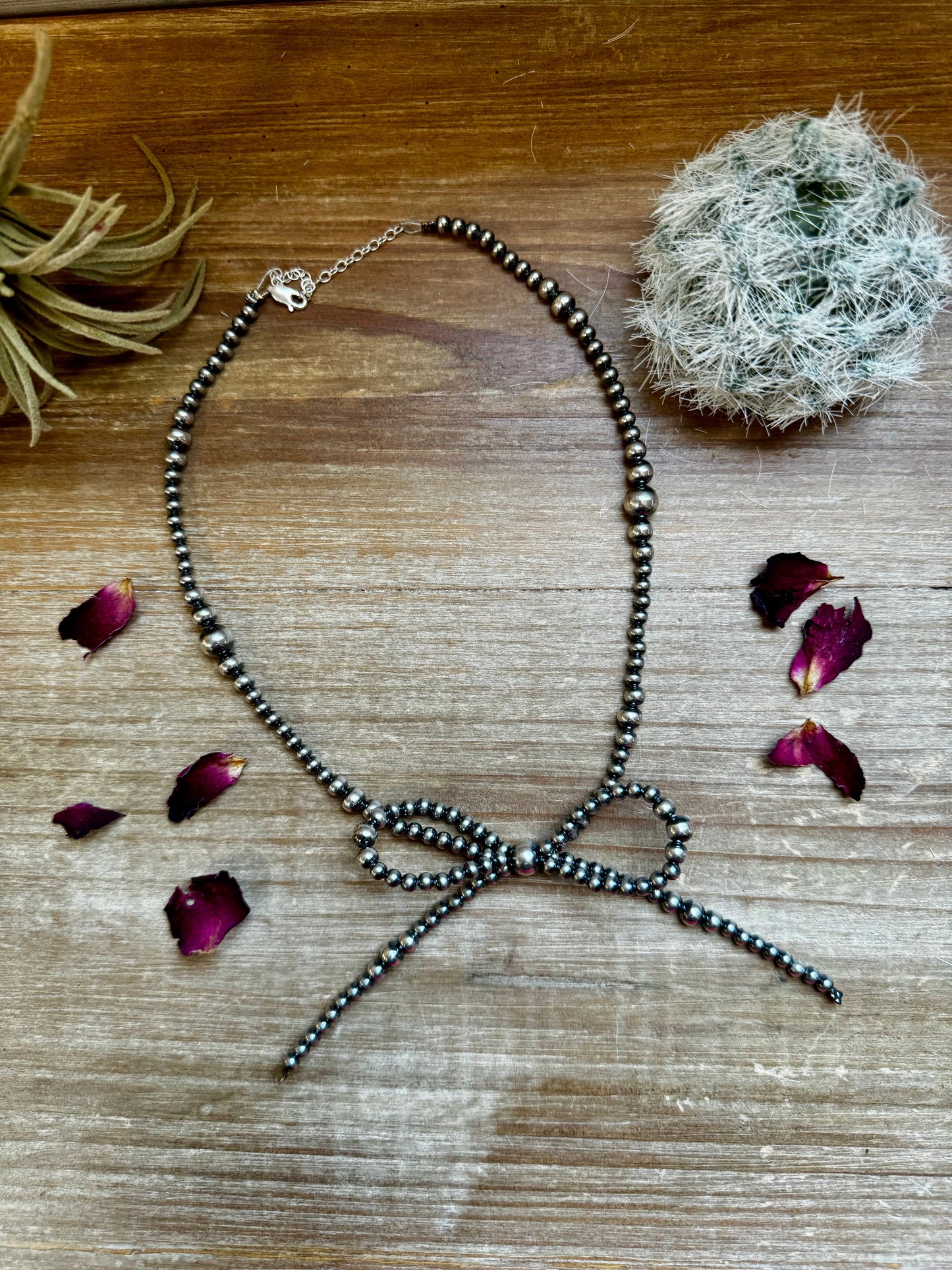 Sterling Pearl Graduated 15 Inch Bow Necklace